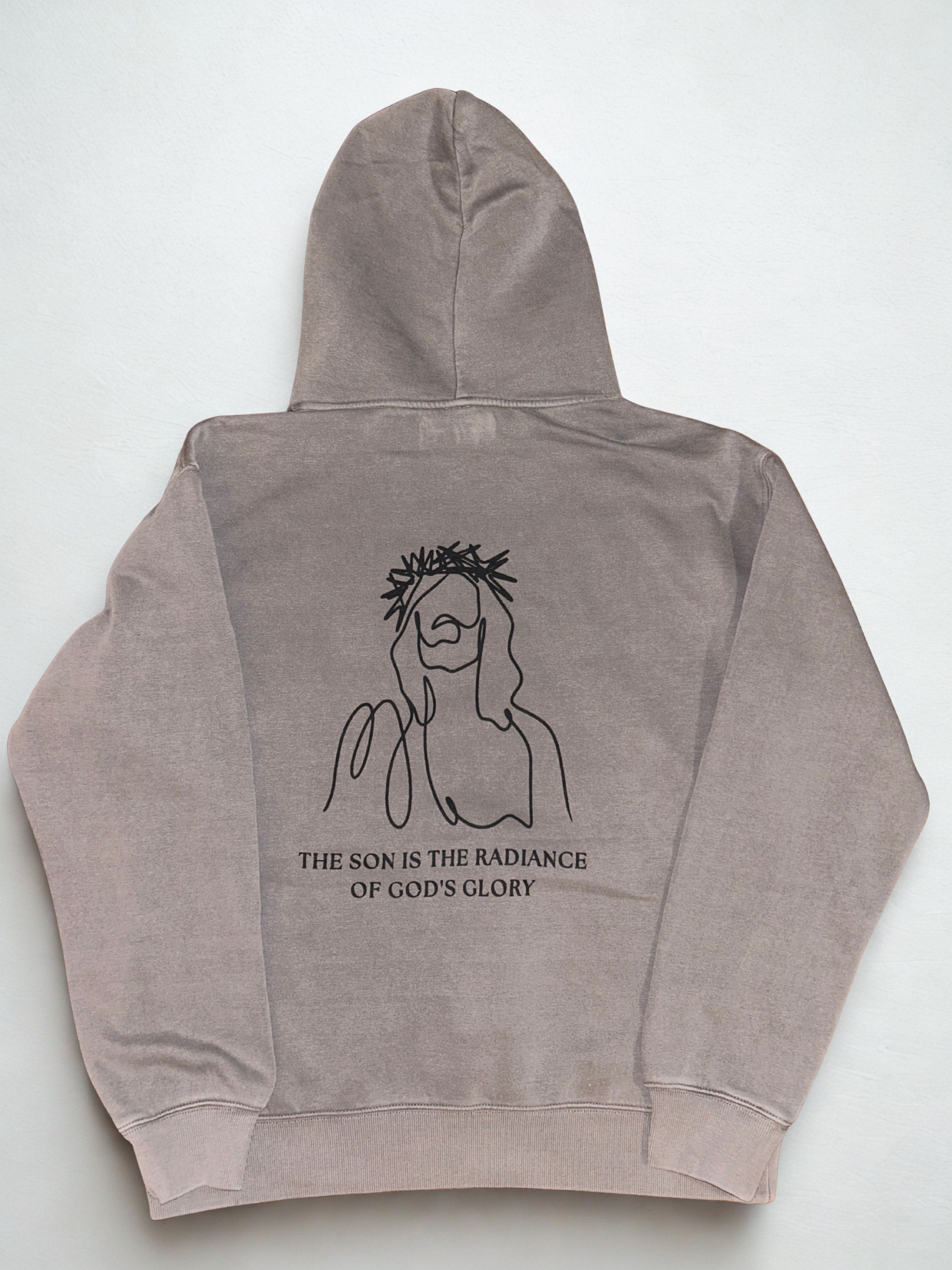Brown hoodie with a graphic design and text on a white background